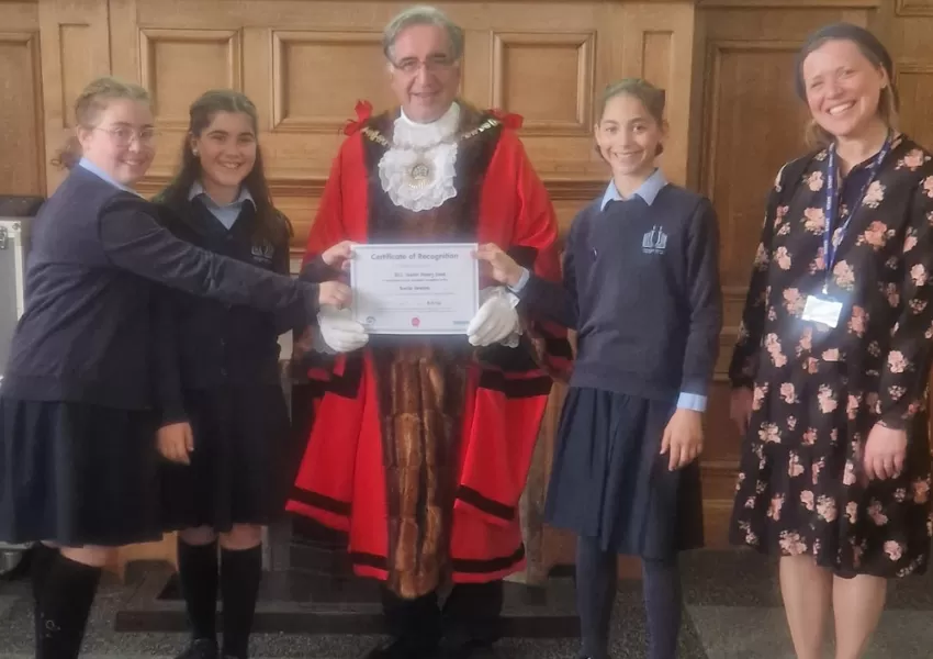 Pupils and staff receiving award from the Mayor of Barnet