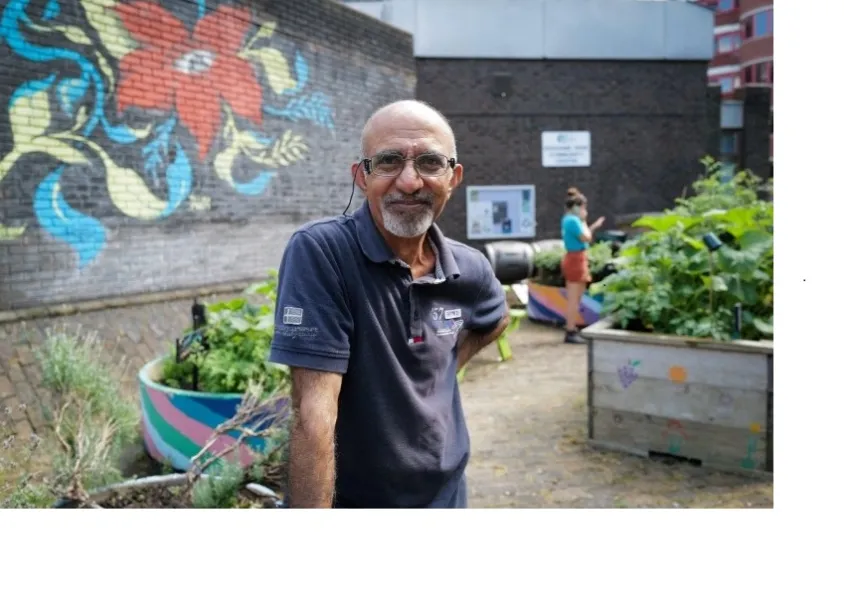 happy man in a garden 
