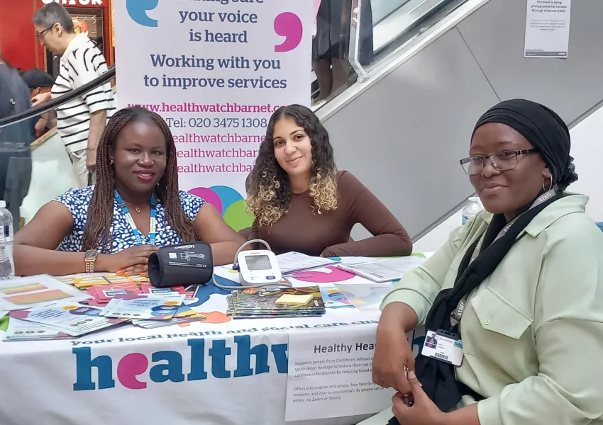 Advisors sitting at the Healthy Heart stall