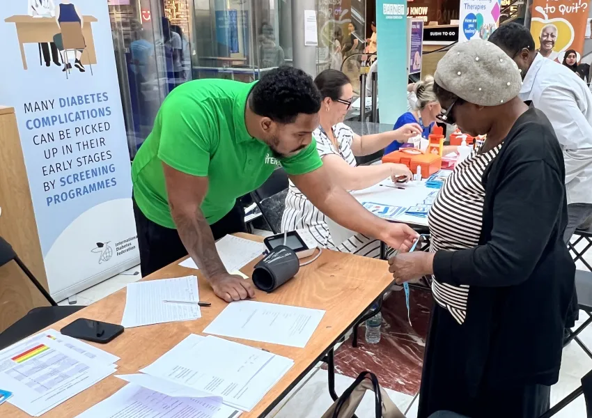 A Barnet resident receiving weight management advice