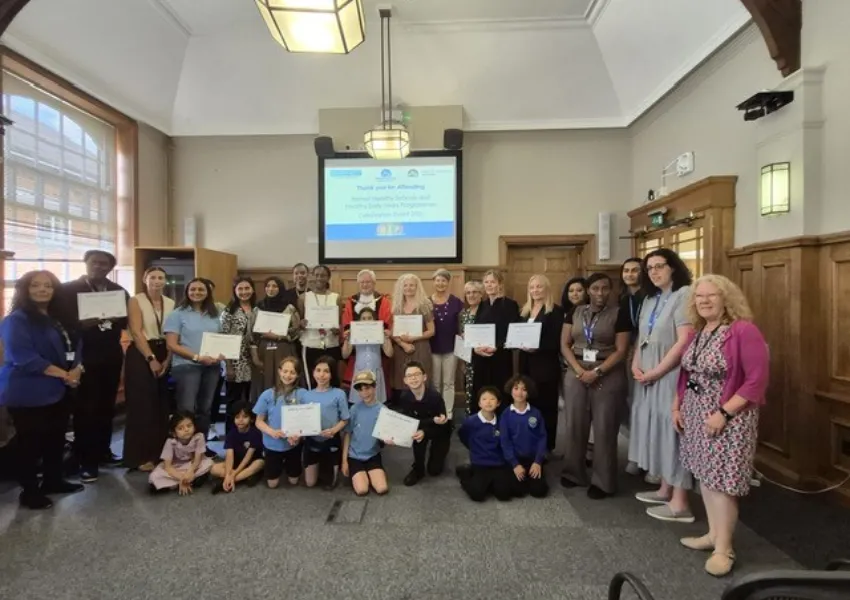 A group photo of all the children, teachers, parents, the mayor and local councillors