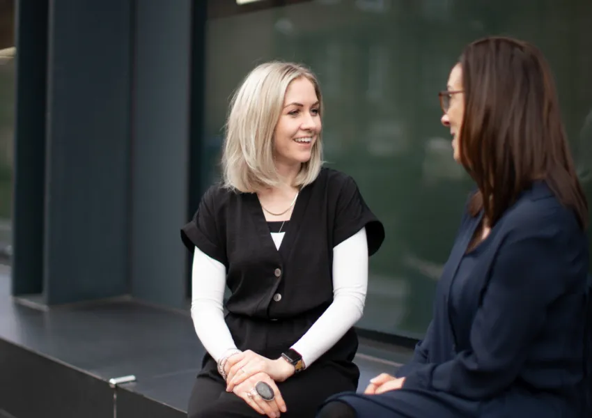 A young woman talking to a Brook Counsellor