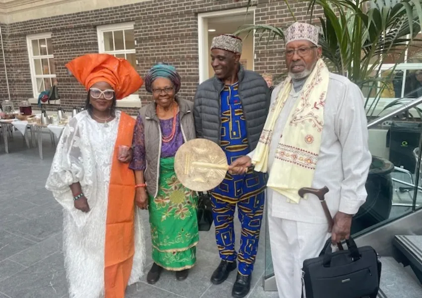 A gruop of older people wearing Nigerian and Somali traditional dress at the Silver Sunday celebration 2025
