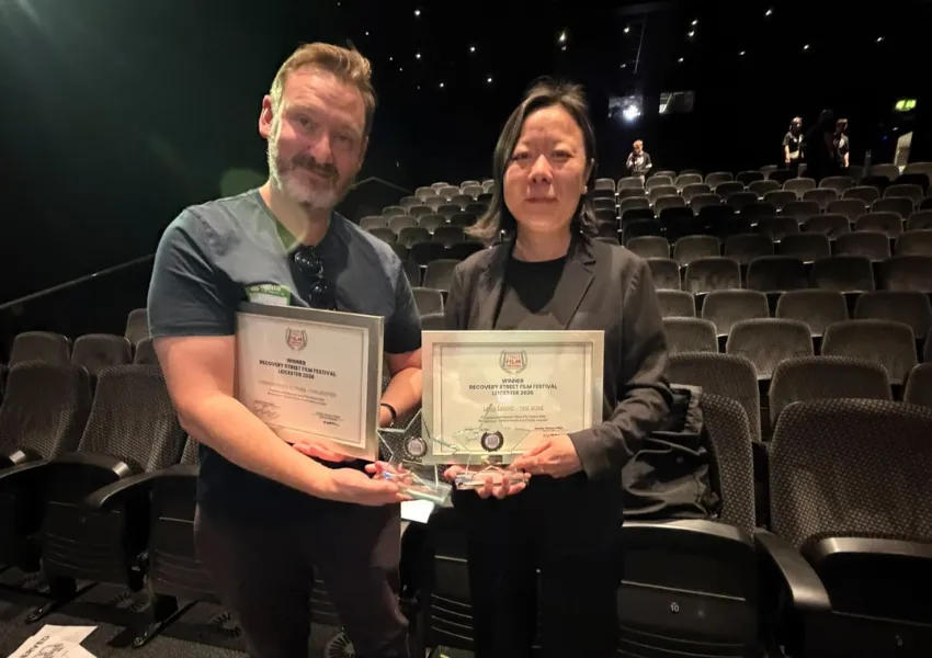 CGL clients Chris and Lena showing their awards