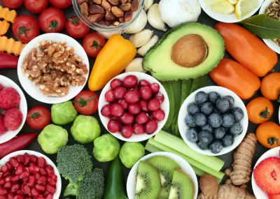 Close up picture of lots of different fresh fruits and vegetables