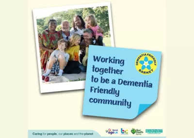 Polaroid photo of a family with post-it note with cursive font 'Working together to be a dementia friendly community'