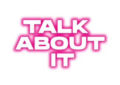 Logo - pink writing in capital letters on white background: TALK ABOUT IT