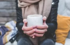 hands holding a hot drink