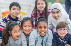 a group of kids smiling