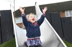 child on slide